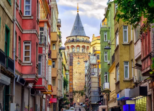 stock-photo-galata-tower-and-the-street-in-the-old-town-of-istanbul-turkey-554343394
